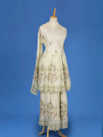 Ivory Cotton Sharara Salwar Suit Adorned with Printed Floral Design and Lace work, Paired with Dupatta - Diadem