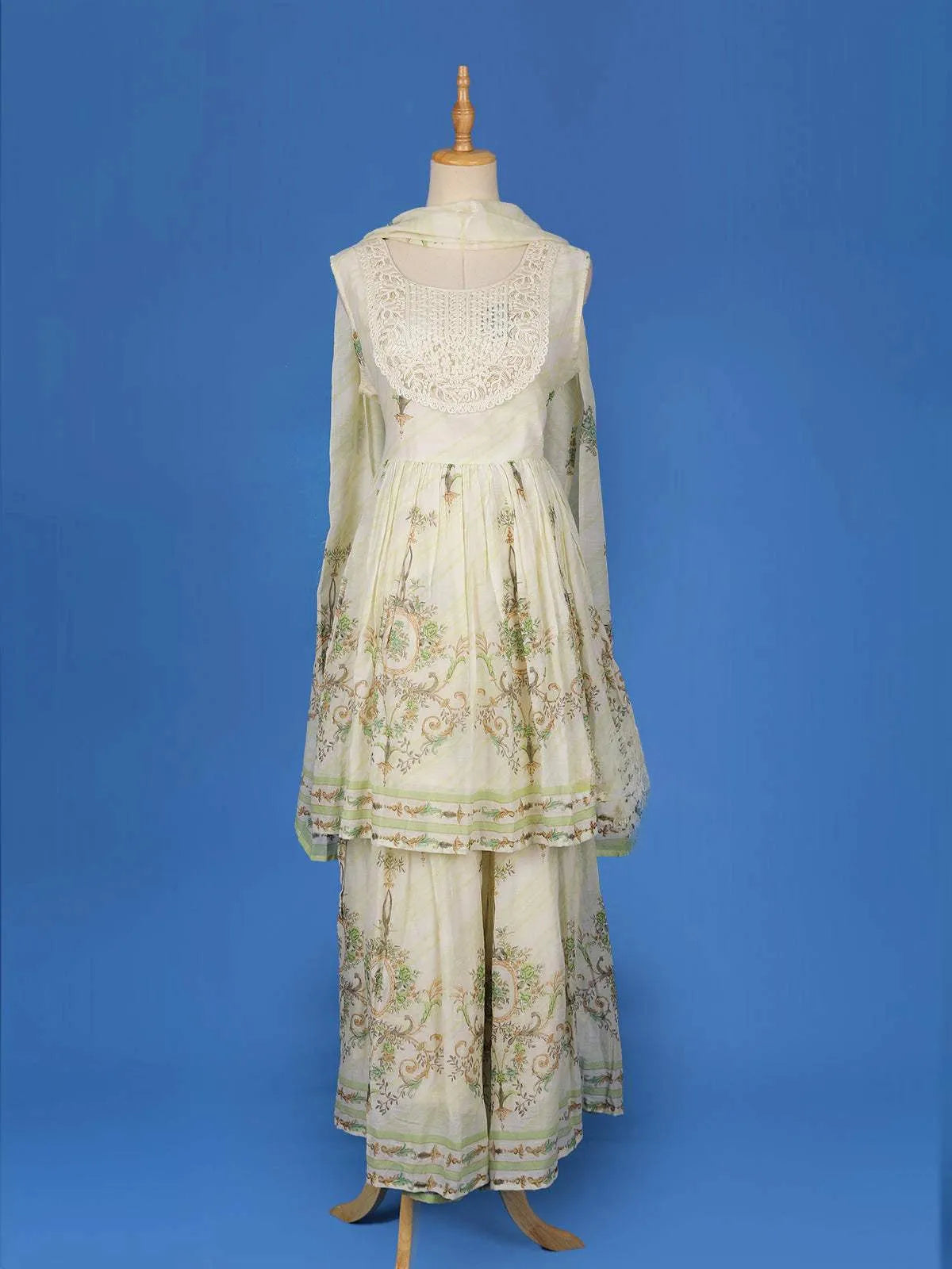 Ivory Cotton Sharara Salwar Suit Adorned with Printed Floral Design and Lace work, Paired with Dupatta - Diadem
