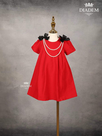 Red Denim Cotton Frock with Attached Bow and Beaded Mala - Diadem