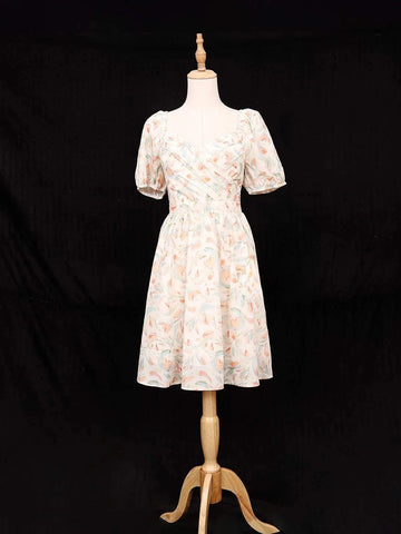 Ivory Frock Adorned with Floral and Ruffled Design - Diadem