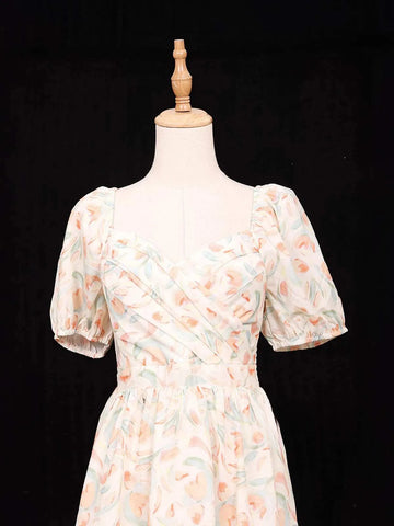 Ivory Frock Adorned with Floral and Ruffled Design - Diadem