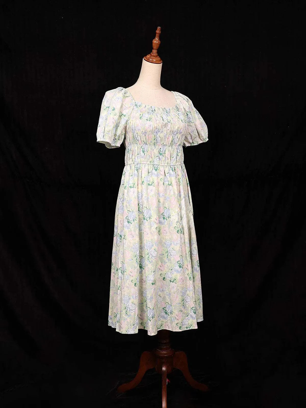 Green Frock Adorned with Floral and Ruffled Designs - Diadem