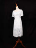 White Frock Embellished with Floral Designs - Diadem