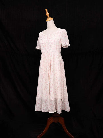 Pink Frock Adorned with Floral and Ruffled Designs - Diadem