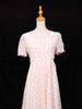 Pink Frock Adorned with Floral and Ruffled Designs - Diadem