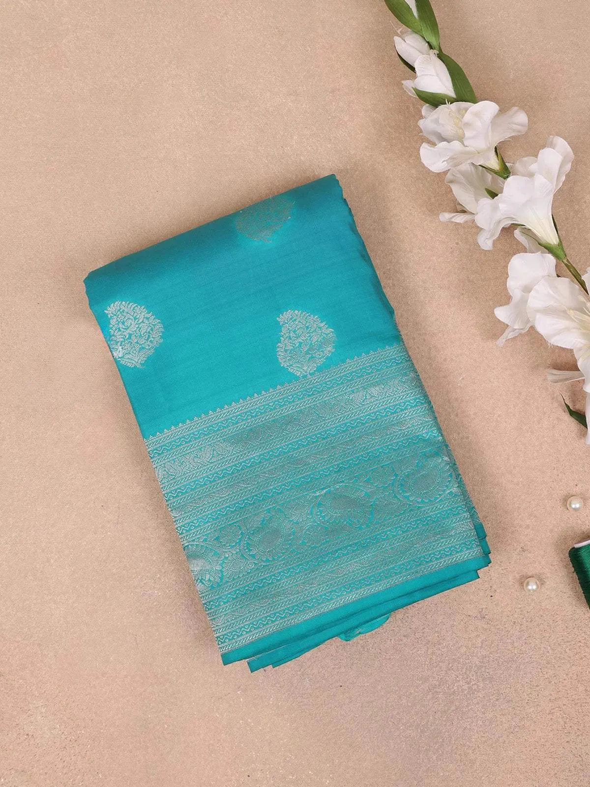 Turquoise Blue Pure Kanchipuram Bridal Silk Saree with Paisley Motif on the Body with Zari Border - Diadem