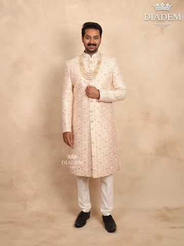 Cream Raw Silk Sherwani Suit with Floral Threadwork Embroidery, Paired with Bead Mala - Diadem