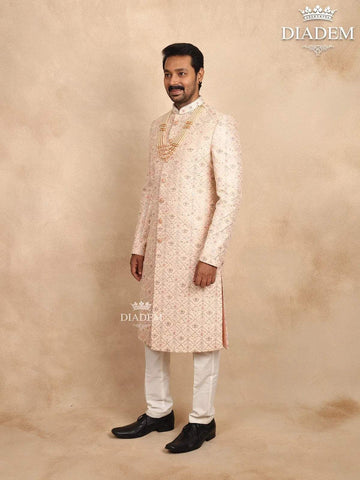 Cream Raw Silk Sherwani Suit with Floral Threadwork Embroidery, Paired with Bead Mala - Diadem