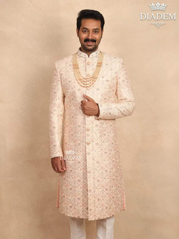 Cream Raw Silk Sherwani Suit with Floral Threadwork Embroidery, Paired with Bead Mala - Diadem