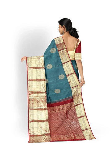 Teal Green Pure Kanchipuram Pattu Saree with Zari Butta on the Body and Zari Border - Diadem