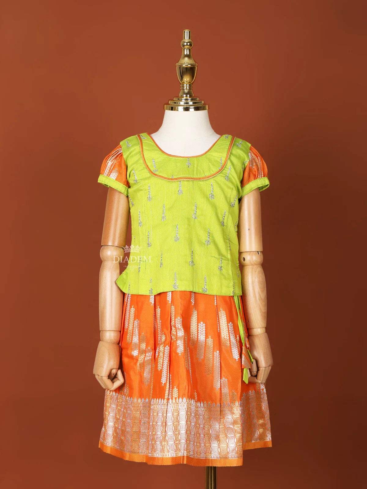 Orange and Parrot Green Pattu Pavadai Set with Intricate Floral Zariwork - Diadem