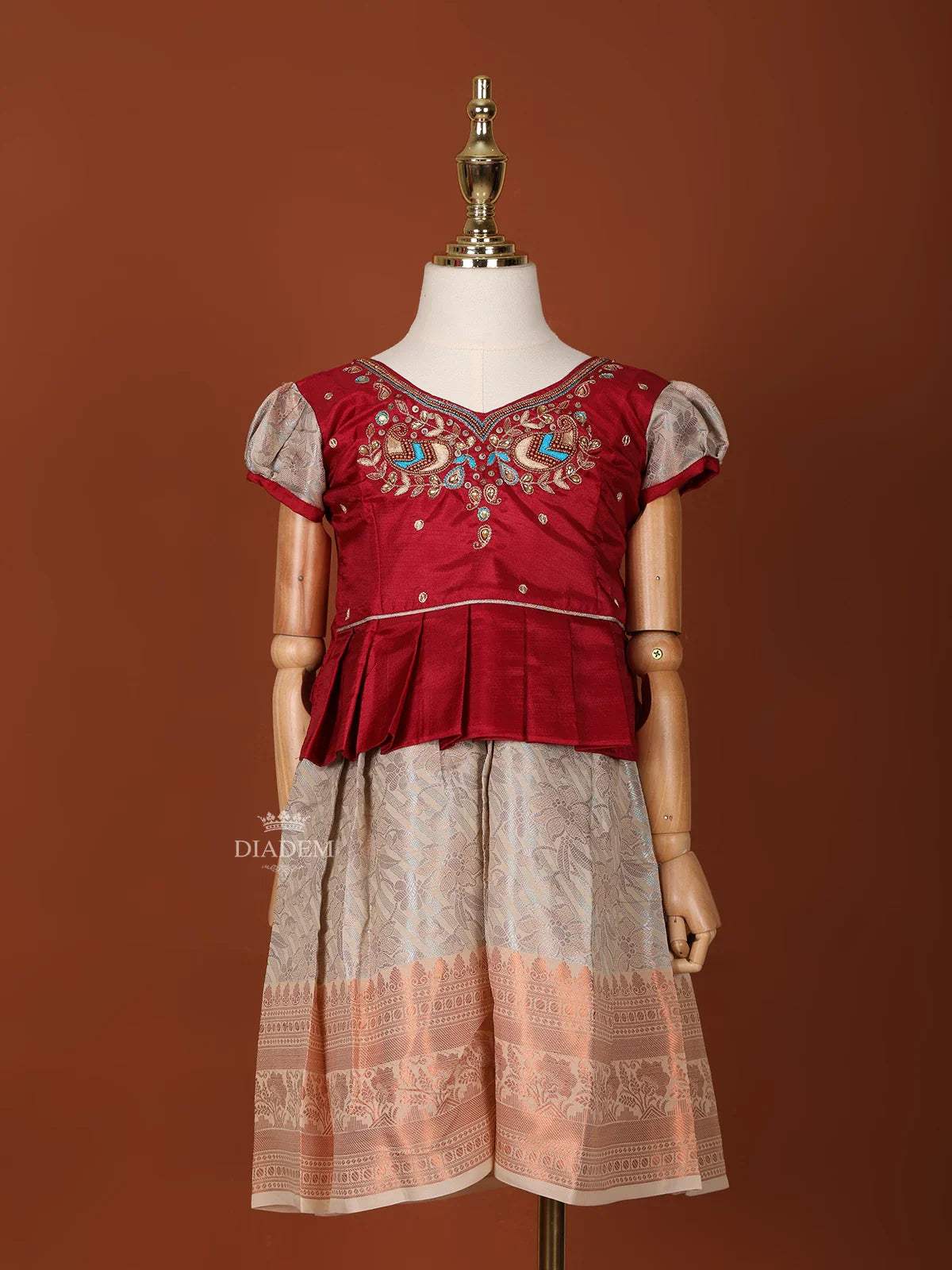Peach and Maroon Silk Pattu Pavadai Adorned with Floral Embroidery and Zariwork - Diadem