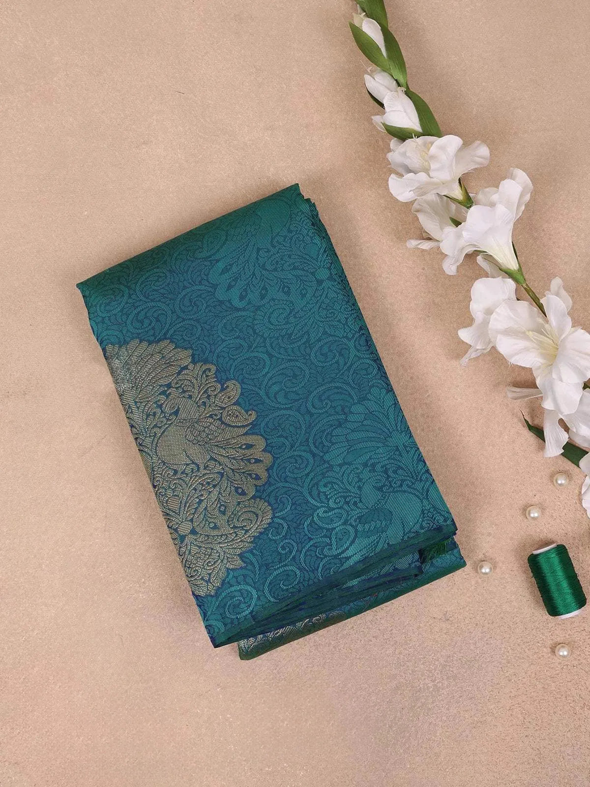 Teal Blue Pure Kanchipuram Bridal Silk Saree with Floral Jacquard Design on the Body with Zari Border - Diadem