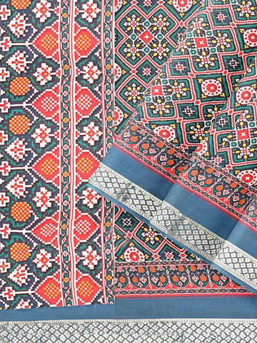 Teal Semi Tussar Silk Saree with Patola Prints on the body and Zari Border - Diadem