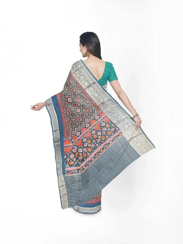 Teal Semi Tussar Silk Saree with Patola Prints on the body and Zari Border - Diadem