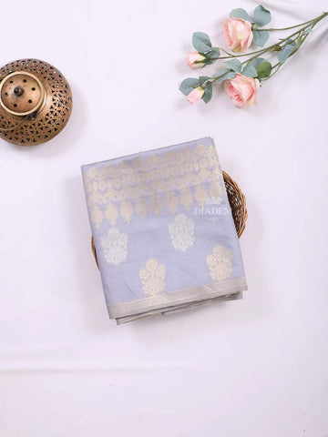 Light Blue Semi Tussar Silk Saree with Zari Butta on the Body and without Border - Diadem