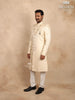 Cream Raw Silk Sherwani Suit Adorned with Floral Embroidery, Paired with Brooch and Bead Mala - Diadem