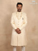 Cream Raw Silk Sherwani Suit Adorned with Floral Embroidery, Paired with Brooch and Bead Mala - Diadem