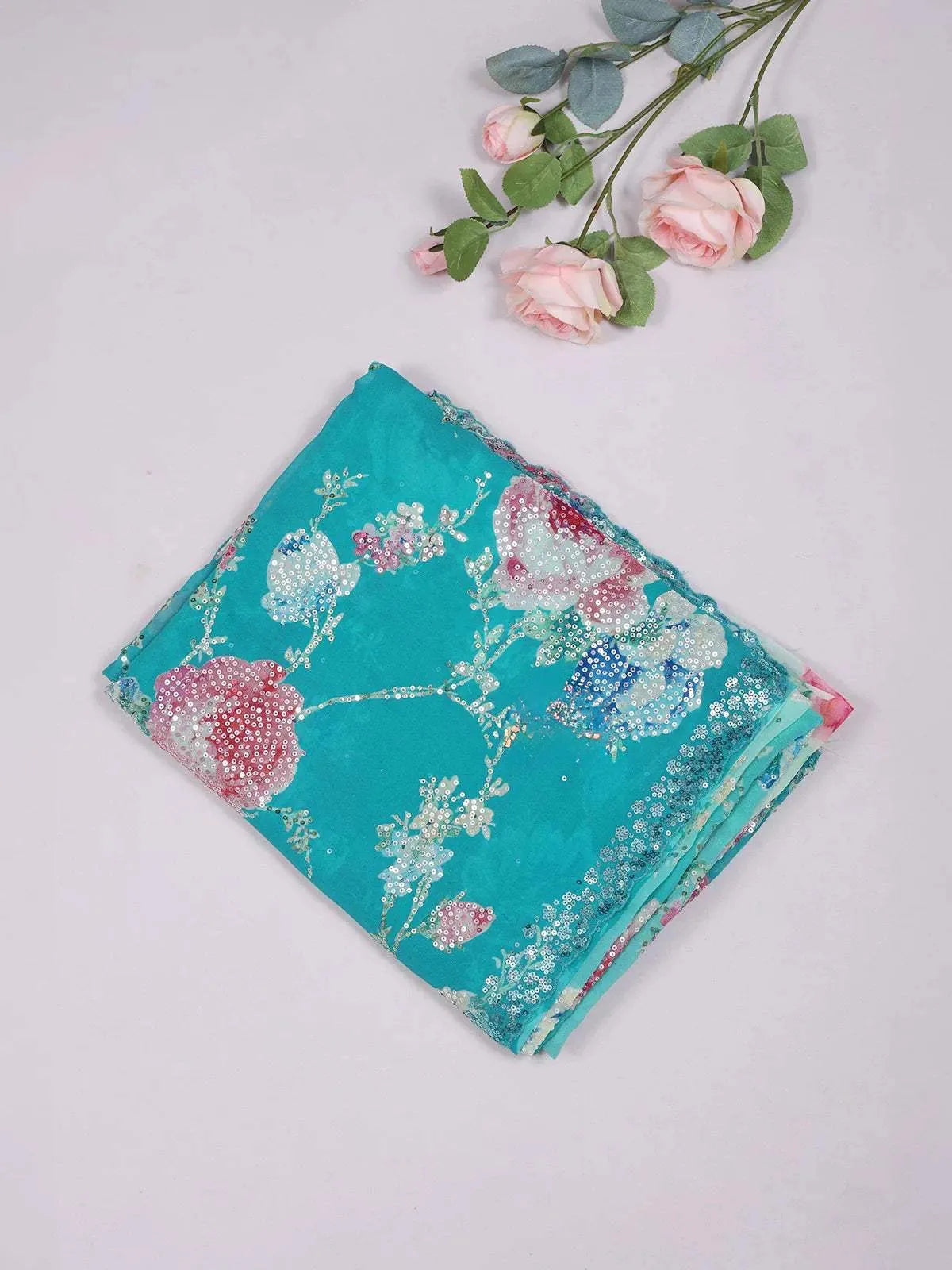 Turquoise Green Organza Saree with Floral Prints on the body and Sequins Border - Diadem