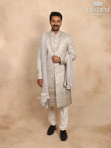 Ash Raw Silk Sherwani with Floral Threadwork Embroidery Paired with Dupatta and Bead Mala - Diadem