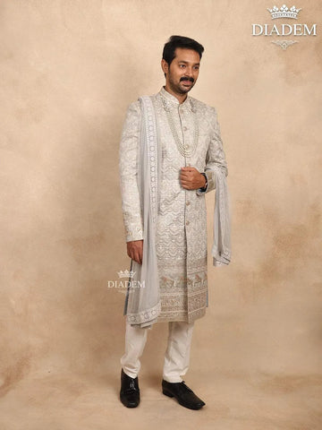 Ash Raw Silk Sherwani with Floral Threadwork Embroidery Paired with Dupatta and Bead Mala - Diadem