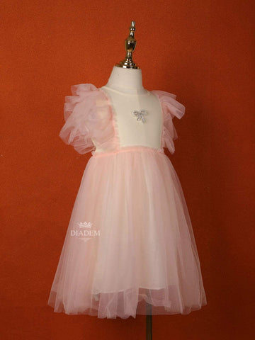 Light Pink Net Frock with Ruffle Sleeves and Attached Bow - Diadem