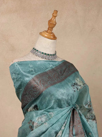 Teal Tussar Silk Saree with Floral Prints on the body and Thread Border - Diadem