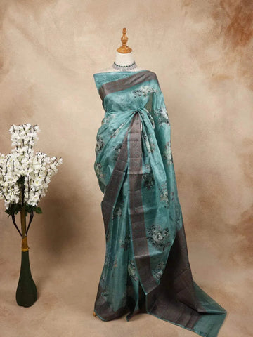 Teal Tussar Silk Saree with Floral Prints on the body and Thread Border - Diadem