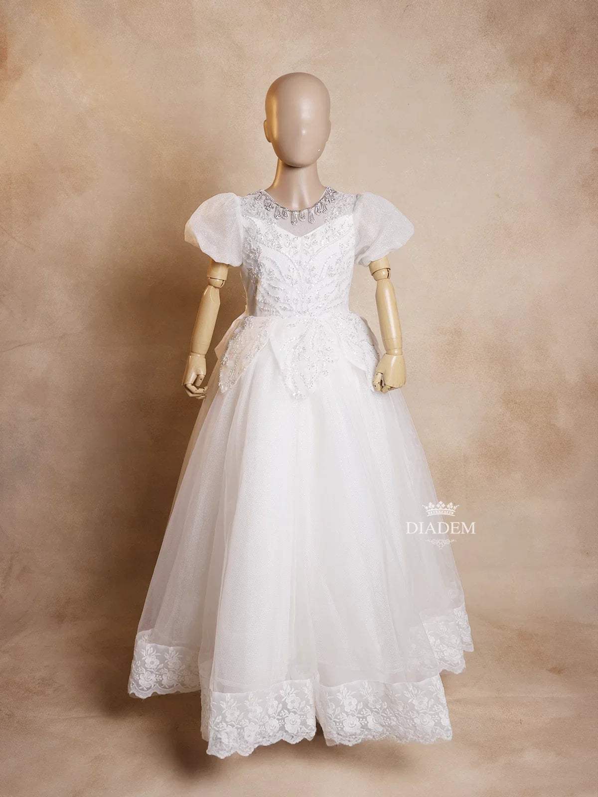 White Net Ball Gown Adorned with Floral Embroidery featuring Puff Sleeves - Diadem