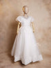 White Net Ball Gown Adorned with Floral Embroidery featuring Puff Sleeves - Diadem