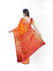 Orange Art Silk Saree With Floral Motif On the Body with Contrast Zari Border - Diadem