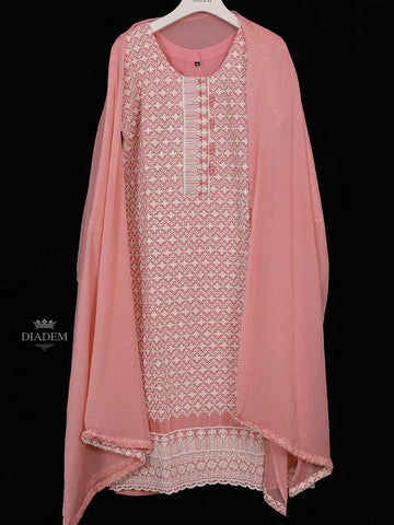 Peach Cotton Straight Cut Salwar Suit for Girls Adorned with Floral Threadwork Embroidery, paired with Dupatta - Diadem