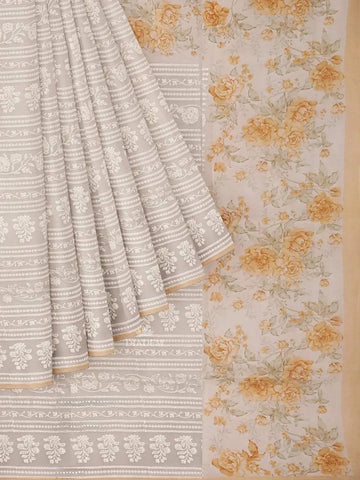 Ivory and Mustard Organza Saree with Floral Threadwork and Prints on the Body, and Design Border - Diadem