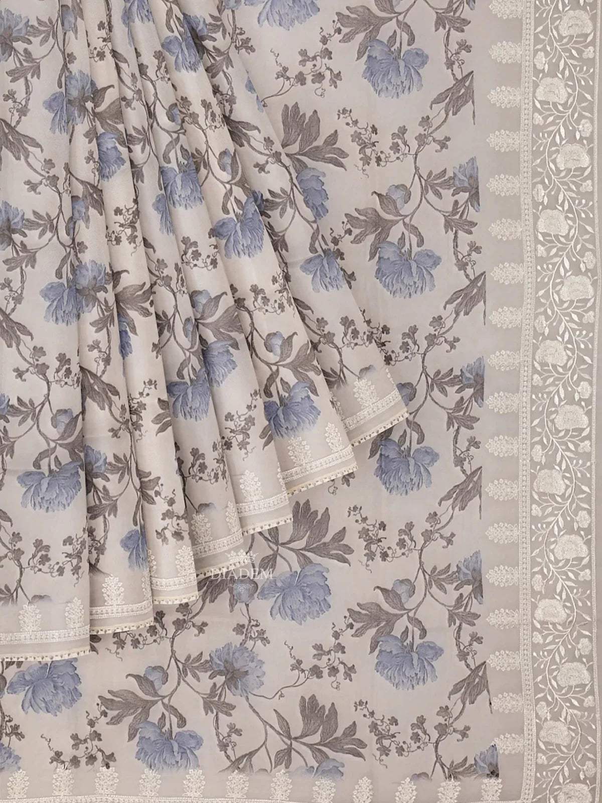 Ivory and Blue Organza Silk Saree with Floral Prints on the body and Embroidery Border - Diadem