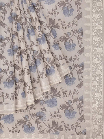 Ivory and Blue Organza Silk Saree with Floral Prints on the body and Embroidery Border - Diadem