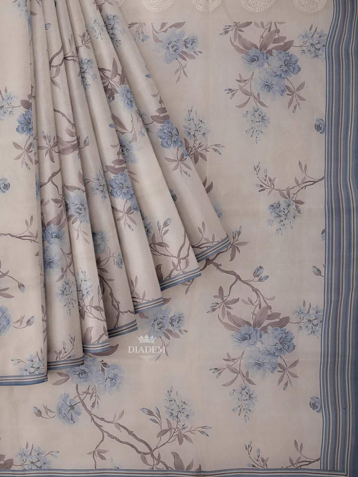 Ivory and Blue Organza Silk Saree with Floral Prints on the body and Embroidery Border - Diadem