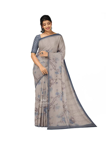 Ivory and Blue Organza Silk Saree with Floral Prints on the body and Embroidery Border - Diadem