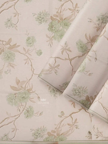 Ivory and Green Organza Silk Saree with Floral Prints on the body and Embroidery Border - Diadem