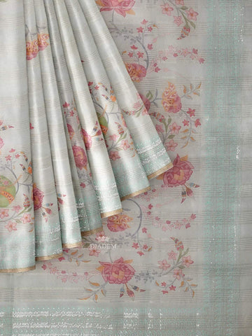 Light Blue Organza Silk Saree with Floral Prints on the body and Embroidery Border - Diadem