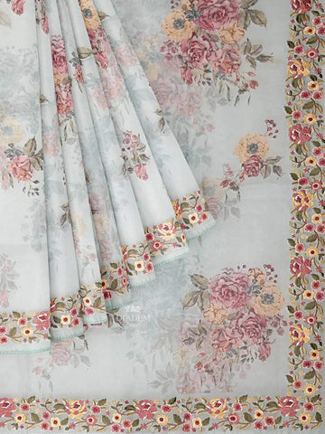 Light Blue Organza Silk Saree with Floral Prints on the body and Embroidery Border - Diadem