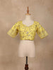 Light Yellow Organza Saree with Floral Designs on the Body and Paired with Designer Blouse - Diadem