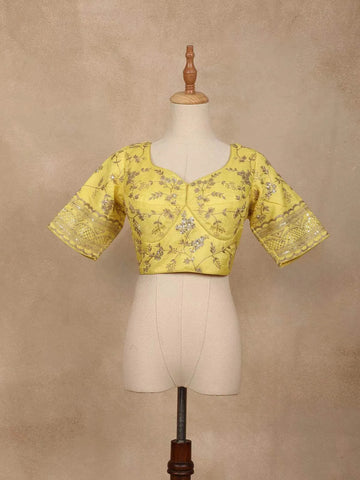 Light Yellow Organza Saree with Floral Designs on the Body and Paired with Designer Blouse - Diadem