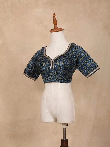 Olive Green Organza Saree with Floral Designs on the Body and Embroidered Border Paired with Blouse - Diadem