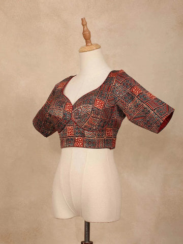 Red Organza Saree with Floral Designs on the Body and Embroidered Border Paired with Blouse - Diadem