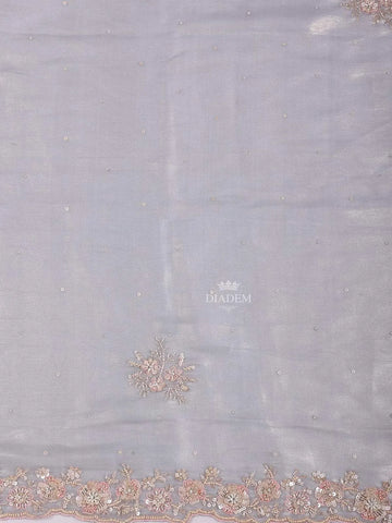 Blue Grey Tissue Organza Saree with Floral Designs on the body and Embroidery Border - Diadem