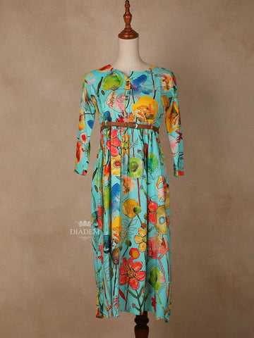 Aqua Blue Cotton Maxi Dress for Girls Adorned with Floral Prints and Waist Belt - Diadem