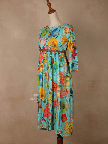 Aqua Blue Cotton Maxi Dress for Girls Adorned with Floral Prints and Waist Belt - Diadem