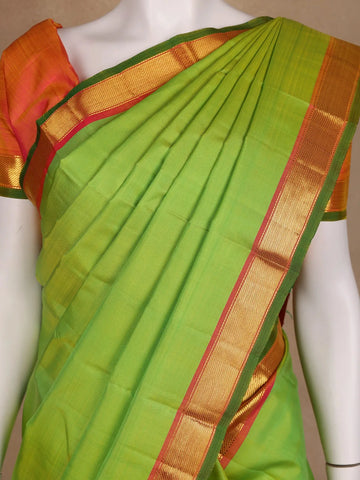 Parrot Green Solid Zari Border Kanchipuram Silk Saree - Diadem