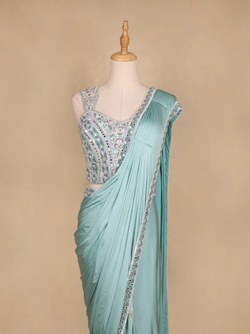 Aqua Blue Satin Saree with Plain Body Paired with Full Sleeve Designer Blouse - Diadem