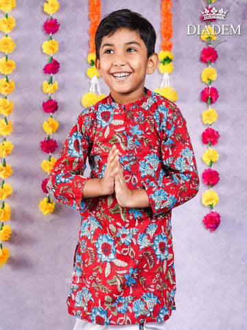 Deep Carmine Kurta Adorned in Floral Prints and Paired With Off White Dhoti Pants - Diadem
